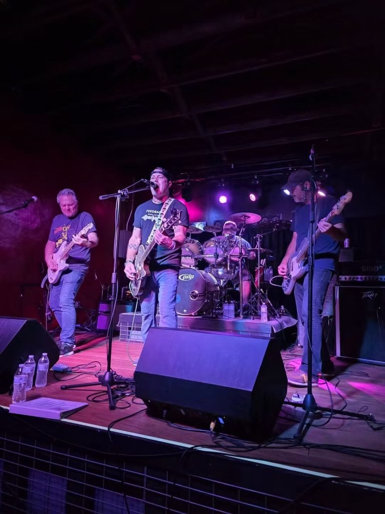Live band on the Feedback Music Lounge stage